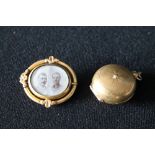 SOVEREIGN HOLDER - a brass sovereign holder and a Victorian swivel hair brooch currently featuring