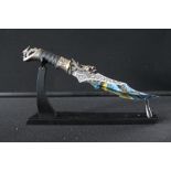 DRAGON DAGGER - with coloured blade, comes with a display stand.  Measures 15" overall with 9.