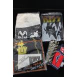 KISS - a selection of rare Kiss clothing to include 'The Cook' apron, a fur patterned scarf,