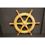 NAUTICAL - SHIPS WHEEL - a Sampson Lawrence oak ships wheel, with brass boss, c.193060cm diameter.