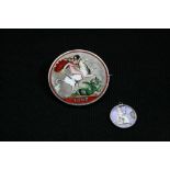 ENAMELLED SILVER CROWN - a Queen Victoria silver 1887 Crown that has been made into a brooch and