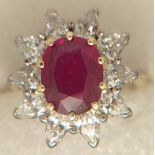 RUBY CLUSTER RING - a Ruby & Diamond cluster ring set in 18ct gold,