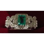 EMERALD DECO STYLE RING - a Emerald cut Emerald & Diamond ring, set in Platinum.  The Emerald is 0.