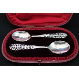 A PAIR OF LATE VICTORIAN SILVER BERRY SPOONS - a cased pair of London hallmarked 1897 silver