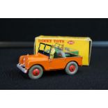 DINKY TOYS - a 340 Dinky Land-Rover die cast toy car in original box. Coloured orange.