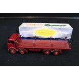 DINKY TOYS - a 905 Dinky die cast model Foden Flat Truck with chains in metallic red.