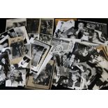 PRESS PHOTOGRAPHS - three folders containing 300+ press photographs of famous individuals and