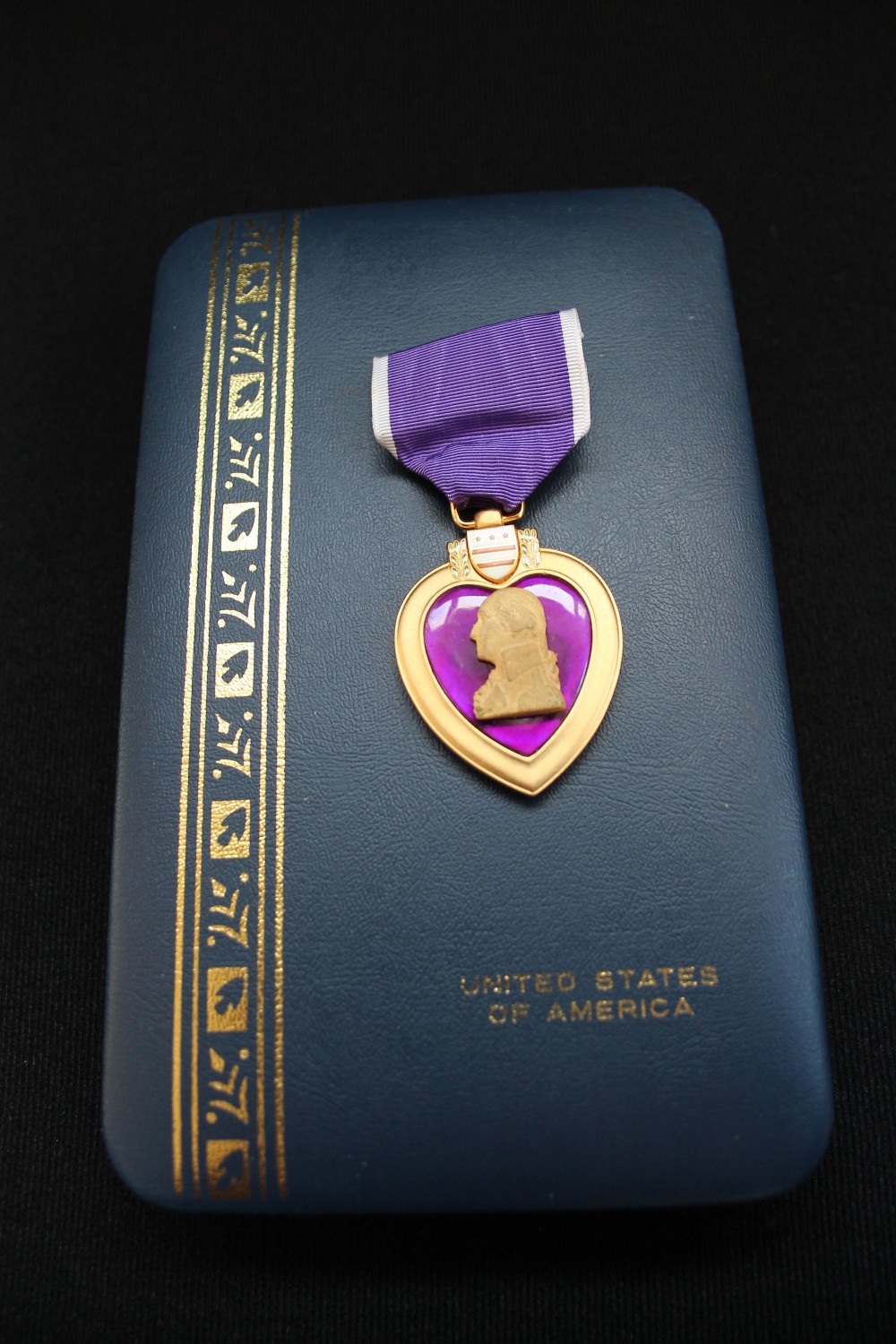 US MEDALS - to include an American Purple Heart and a Bronze Star awarded to John E Yerkey (boxed).