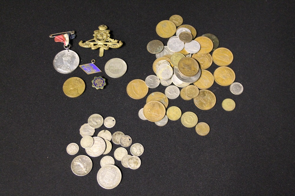 COINAGE - a mixed collection of World coinage to include a small amount of silver (71g) and various