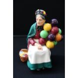 ROYAL DOULTON - a Royal Doulton figure "The Old Balloon Seller" HN 1315.