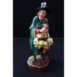 ROYAL DOULTON - a Royal Doulton figure "The Mask Seller" HN 2103.