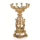 Auguste BreulGRANDE CANDELABRO, PARIGI, 1855 CIRCAin bronzo dorato a dodici luci. Su una pedana