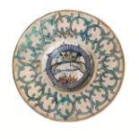 PIATTO, DERUTA, 1520 CIRCAin maiolica decorata in policromia, cavetto profondo e larga tesa piana