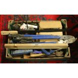 A box of assorted tools including mitre