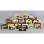 A collection of boxed diecast model cars
