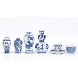 Seven pieces of Chinese blue and white porcelain. Four vases, a chocolate cup and saucer and a sugar