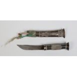 An Eastern silver mounted dagger in sheath decorated with filigree work, 21.5cm. Condition Report.