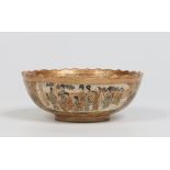 A Japanese Meiji period Satsuma fluted bowl. Decorated with panels of figures over stylized gilt and