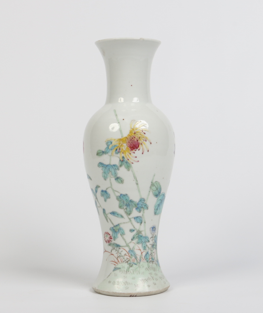 A Chinese baluster famille rose mantel vase. Sparsley decorated to one side with flowers. Printed