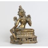 An antique Eastern bronze figure of Padmapani, possibly Tibetan. Sat in meditation upon a lotus