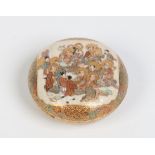A Japanese Satsuma miniature circular pot and cover. Decorated to the cover with a gathering of