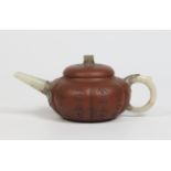 A Chinese Yixing teapot and cover with jade spout, handle and knop. Of lobed compressed globular