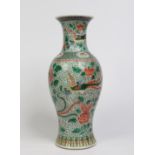 A nineteenth century Chinese baluster floor vase with turquoise glazed interior and base.