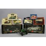 A collection of Diecast model cars and v