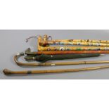 Two walking canes with silver collars an