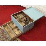 A painted wooden tool chest and contents