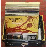 A box of assorted LP records rock and po