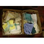 Two boxes of lace and linen and other ma