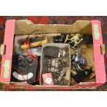 A box containing old engineering tools,