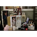 A large collection of boxed dolls and Ch