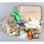 An old suitcase and contents of ladies f