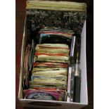 A box of assorted L.P albums and singles