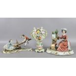 Two Capodimonte ceramic figurines of a l