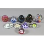 A collection of art glass paperweights t