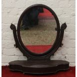 A Victorian carved mahogany dressing mirror.