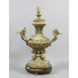 A large decorative brass twin handled tablelamp.