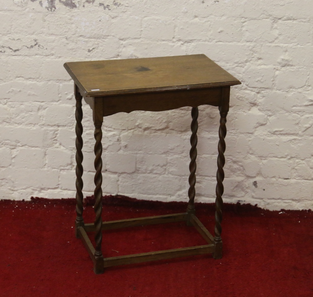 An oak barleytwist occasional table.