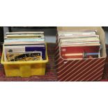 Two boxes of L.P records, mainly orchestral and rock and roll.