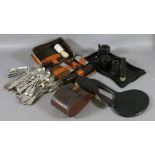 A box of collectables to include silver plated flatwares, ebony dressing table set, clothes brushes,