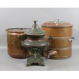 A large copper water tank along with copper and brass tea urn and a copper cooking pot.