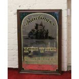 A mahogany framed Rawlings mixing waters and fruit juice advertising mirror.
