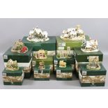 Ten Lilliput Lane model cottages assorted sizes.