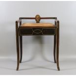 A Victorian inlaid mahogany piano stool/seat with under seat storage and raised on tapering splay