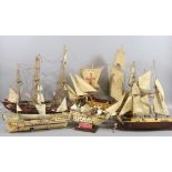 Five wooden scaled models of various galleons.