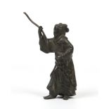 A Japanese bronze figure of a woman dressed in a kimono and holding a pole, 16cm. Condition