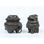 A Chinese bronze censor formed as a Kylin along with another bronze censor of archaistic style and